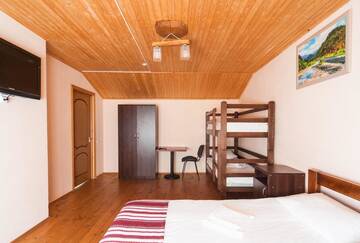 Фото номера Стандартный семейный номер Лоджи River Cottage Complex г. Речка 4